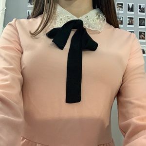 Pink dress with bow and white collar